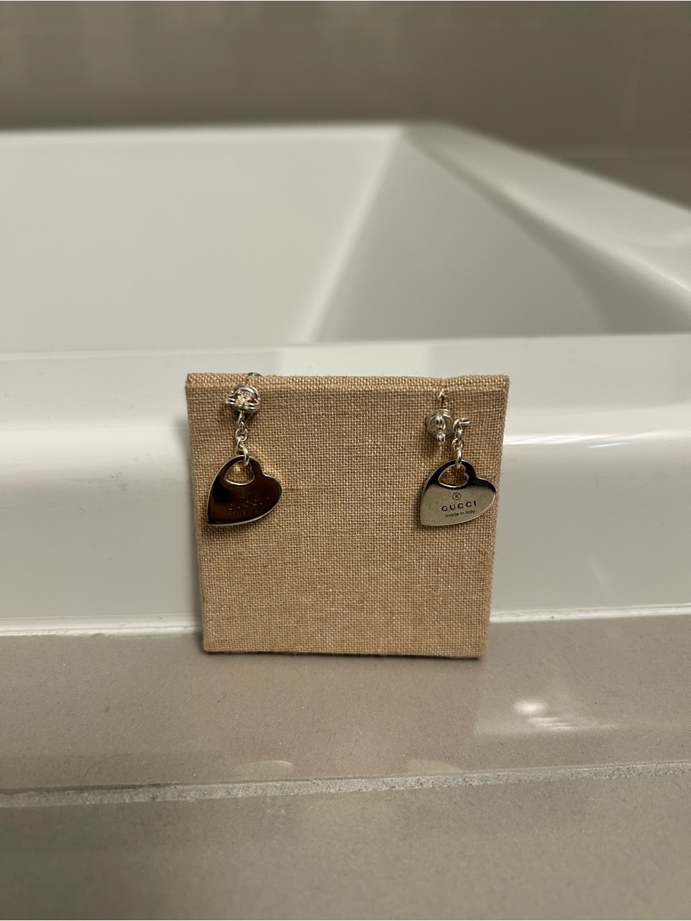 Gucci Silver Heart Drop Earrings with silver ball in front and Heart behind lobe